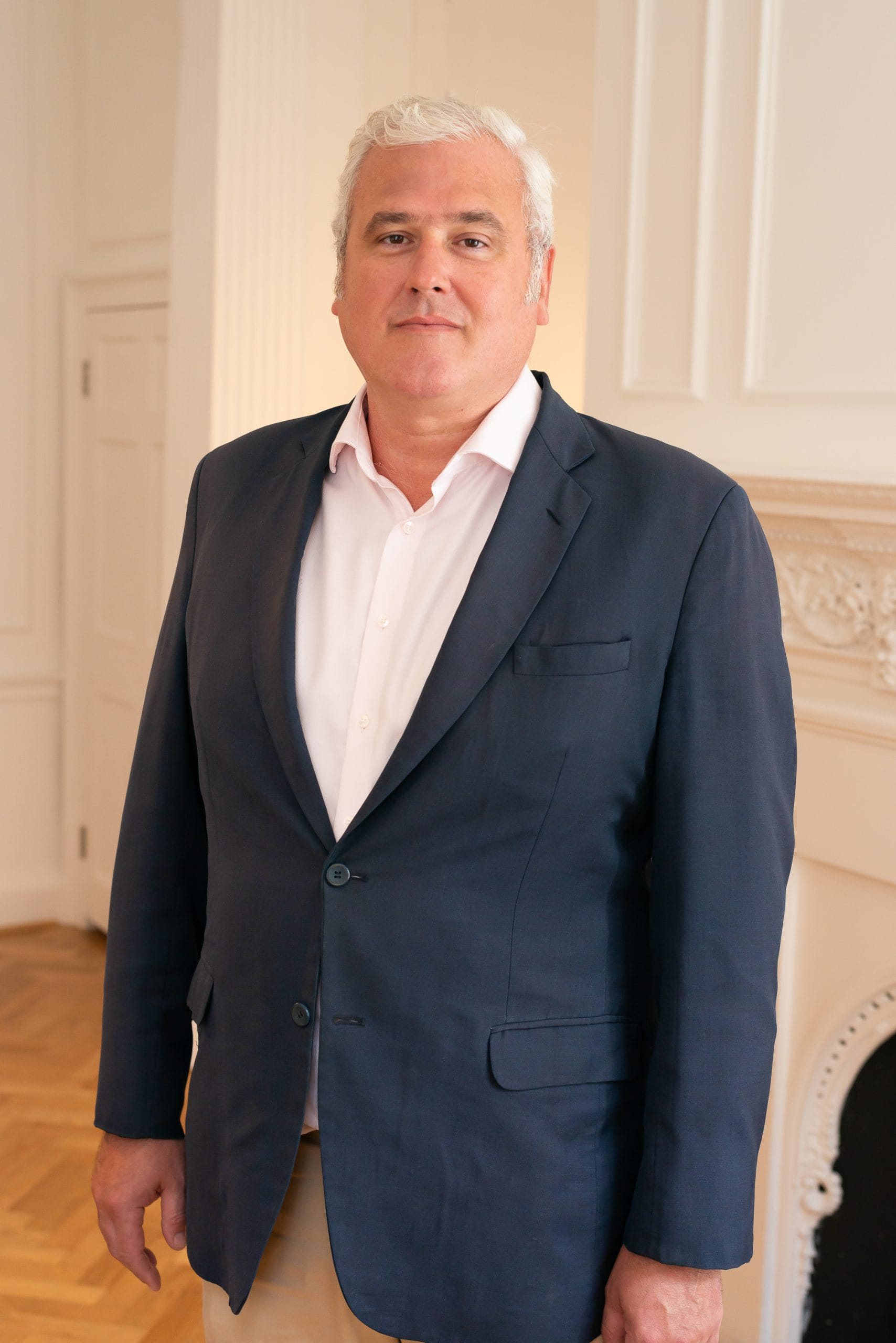 Image: David Adam, Senior Associate, BOP Consulting, standing in the BOP offices.